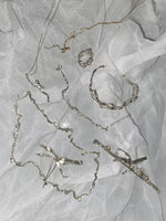 Burnt Bow Pendant - Silver