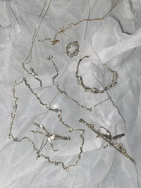 Burnt Bow Pendant - Silver