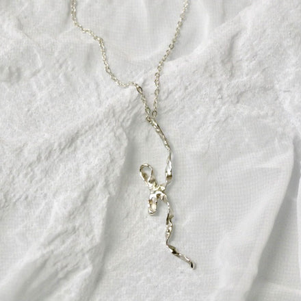 Burnt Bow Pendant - Silver